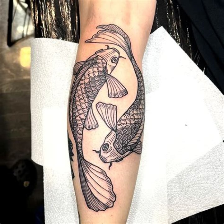 Discover The Hidden Meaning Behind Black And White Koi Fish Tattoos