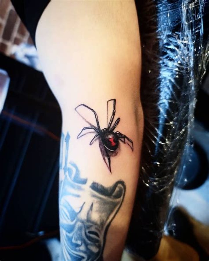 Unleash The Power: Black Widow Spider Tattoos Embellishing Hands