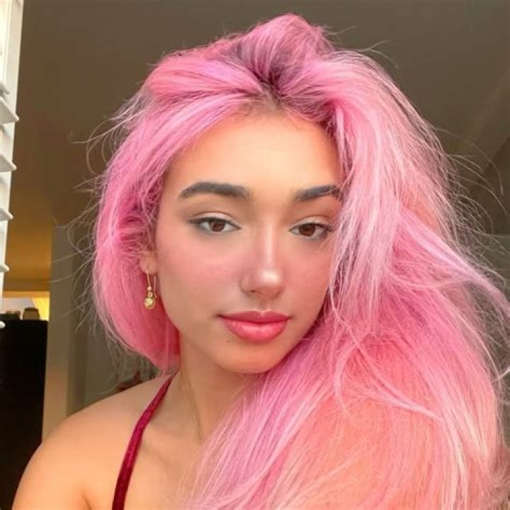 Sizzling And Sensuous: Kat Hixson's Alluring Presence