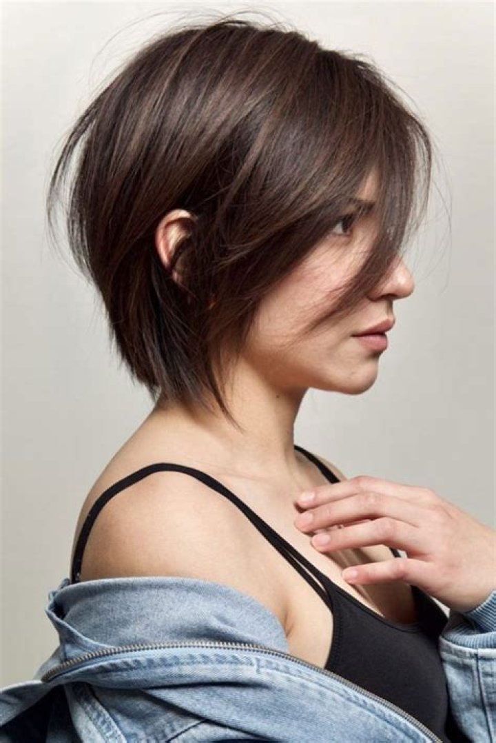 Enchanting Long Pixie Cut With Elongated Bangs: A Timeless Hairstyle