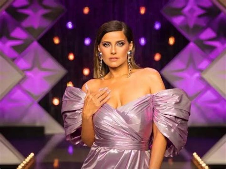 Nelly Furtado's Enchanting Curves And Measurements