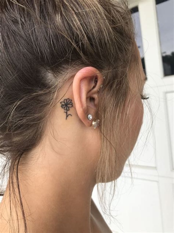 Exquisite Small Behind-the-Ear Tattoos: A Discrete Elegance