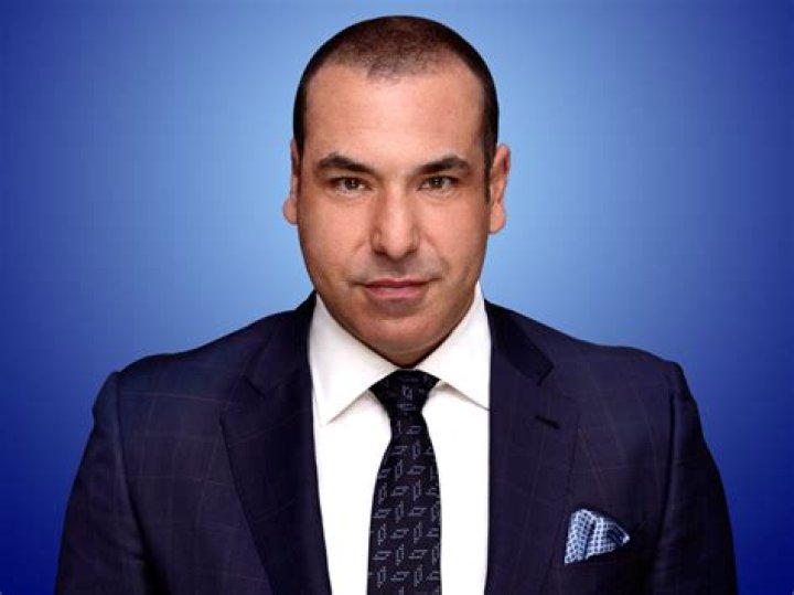Meet The Mysterious Woman Who Captured Louis Litt's Heart In Suits